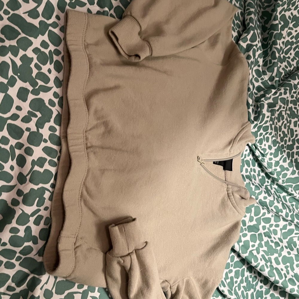 Zip up green cropped long sleeved crew neck